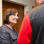 Dean Anne Hiskes smiles at the guests